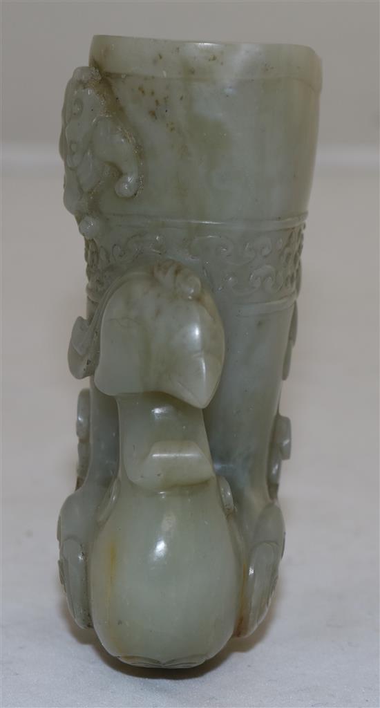 A Chinese archaistic pale celadon jade phoenix rhyton, height 10.2cm